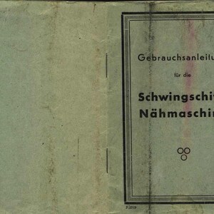 May include: Vintage instruction manual for a Schwing Schiff sewing machine. The cover is a faded green with the title in black, framed by a black border. The text is in German.