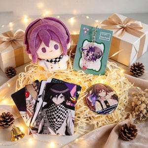 May include: A plush doll with purple hair, an acrylic keychain on a card labeled Acrylic Keychain, a circular pin, and several rectangular cards featuring a character with black hair and a black and white checkered scarf in a gift box.