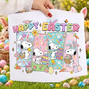 May include: White fabric featuring Snoopy characters celebrating Easter. The design includes the words "HAPPY EASTER" in colorful letters, along with Snoopy holding Easter eggs and baskets. The background has pastel colors and Easter-themed patterns.