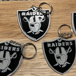 Las Vegas Raiders NFL Football Spinner Keychain