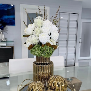 Silk floral arrangement \ magnolia arrangements \ roses centerpieces \ centerpieces \ arrangements