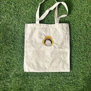 Smiling Anime Character Embroidered on Tote Bag