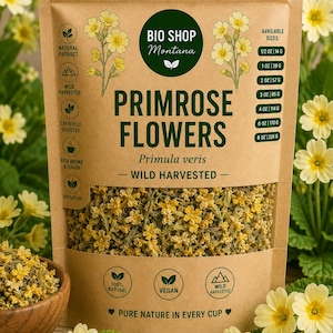 Pode incluir: Uma bolsa de papel castanho de flores de prímula Bio Shop Montana, Primula veris, com uma janela transparente que mostra flores amarelas secas. O rótulo indica tamanhos de 14 g a 226 g e ícones para natural, colheita selvagem e vegan.