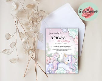 May include: A birthday invitation featuring a unicorn and a swan, with pastel floral accents. The invitation reads "You're invited to Maria's 4th Birthday Celebration" with event details. A white envelope and decorative dried plant stems are also in the image.