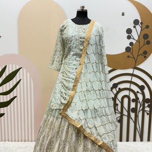 Baby Blue Georgette Lehenga Choli: Embroidered Party Wear with Dupatta