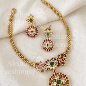 Product Identified: Pendant Necklace Set | Green Ruby Stone Necklace | Matching Earrings | Indian Gold Tone Jewelry Set