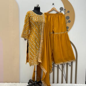 Yellow Georgette Gown With Embroidery Sequence Work and