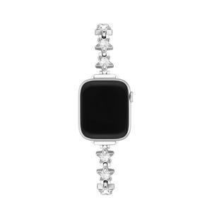 May include: A silver Apple Watch with a star-shaped band. The band is made of metal and has clear crystals embedded in the stars.