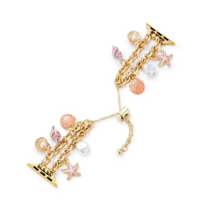 May include: Gold chain Apple Watch band with charms, including seashells, pearls, and starfish. The band is adjustable with a sliding clasp.