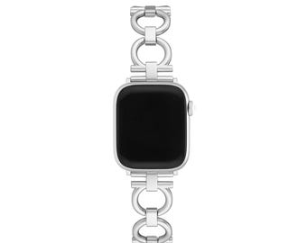 Może przedstawiać: Srebrny zegarek Apple Watch z srebrnym paskiem z ogniw.