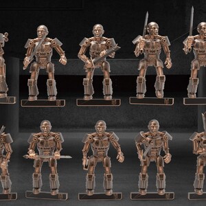 May include: A collection of ten bronze-colored robot figurines, each standing on a rectangular base. The robots have detailed mechanical designs and are holding swords. The figures are arranged in two rows against a dark background.