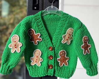 gingerbread motif cardigan for sale, crochet cardigan with cookie man motif for toddler, knitted green christmas cardigan for kids