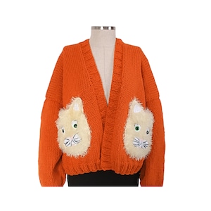 Oversize-Strickjacke mit flauschigen Katzentaschen, süße Oversize-Damen-Strickjacke, gestrickte Katzentasche Detaillierte Strickjacke, gehäkelter Katzentaschenpullover