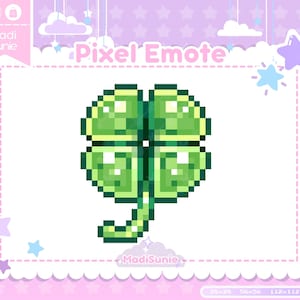 May include: A pixelated four-leaf clover in shades of green, centered on a white background with a scalloped border. The image is framed by a pink background with stars and clouds. Text includes "Pixel Emote" and "Madi Sunie."