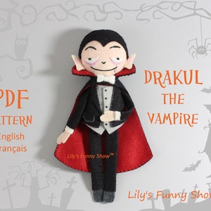 May include: PDF pattern for a felt toy vampire named "Dracul the Vampire". The pattern includes instructions in English and French. The toy is dressed in a black suit with a red cape and has a white collar and a black bow tie.