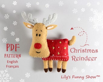 May include: PDF pattern for a felt Christmas reindeer with a red and white sweater. The pattern includes instructions in English and French. The reindeer is brown with a red nose and grey antlers. The pattern is from Lily's Funny Show.