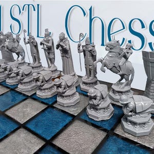May include: A 3D printed chess set with gray pieces on a blue and gray checkered board. The pieces include a king, queen, bishop, knight, rook, and pawn. The set is labeled "3d STL Chess".