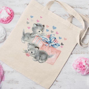 Tote bag aesthetic, Cat tote bag, Coquette Tote Bag, Coquette, Kitschy Tote bag, Kitsch, Dollette Tote Bag ,Coquette Aesthetic, Softcore Bag, Cottagecore Bag, Feminine Tote Bag, Cottagecore Tote Bag, cat purse, cottagecore bag,
reusable grocery bag.