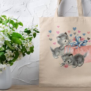 Tote bag aesthetic, Cat tote bag, Coquette Tote Bag, Coquette, Kitschy Tote bag, Kitsch, Dollette Tote Bag ,Coquette Aesthetic, Softcore Bag, Cottagecore Bag, Feminine Tote Bag, Cottagecore Tote Bag, cat purse, cottagecore bag,
reusable grocery bag.