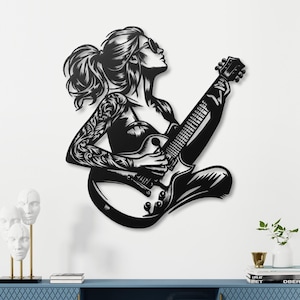 Rock On with Our Female Guitarist Metal Wall Art - Perfect Décor for Music Lovers