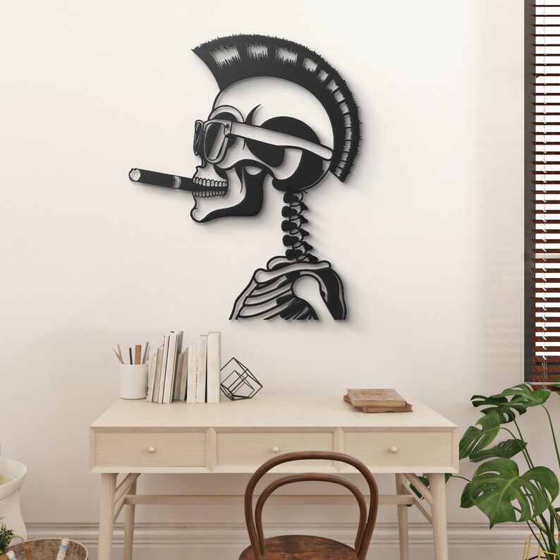 May include: Black and white metal wall art of a skull with a mohawk, sunglasses, and a cigarette. The skull is in profile and has a skeleton body.