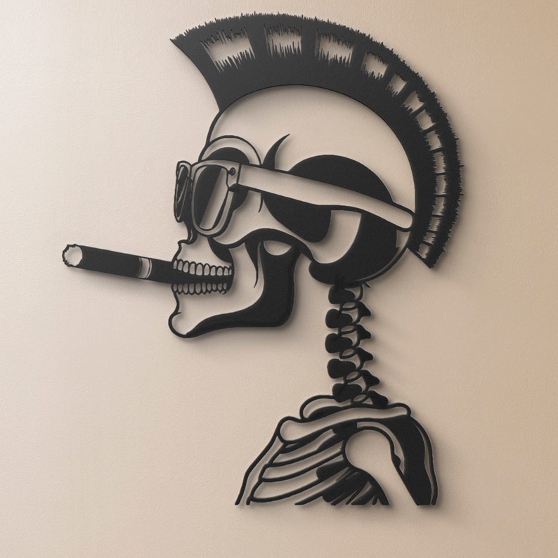 May include: Black and white paper cut-out of a skull with a mohawk, sunglasses, and a cigarette. The skull is wearing a skeleton body.