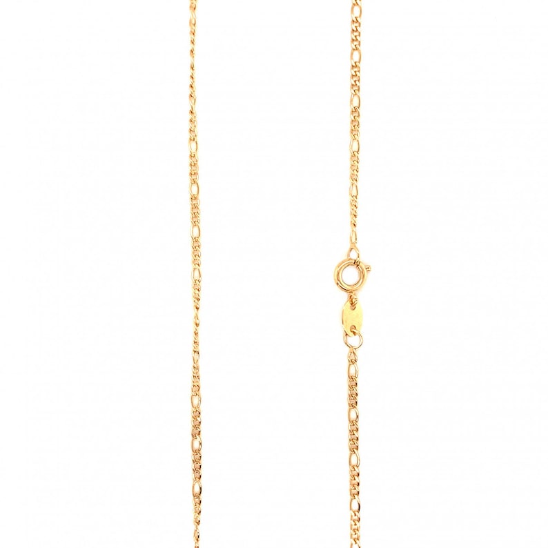 May include: A gold chain necklace with a lobster clasp closure.