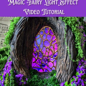 May include: A fairy house with a glowing stained-glass window, surrounded by moss, purple flowers, and a tree trunk. The text "MAGIC FAIRY LIGHT EFFECT VIDEO TUTORIAL" is displayed on a purple banner above the house.