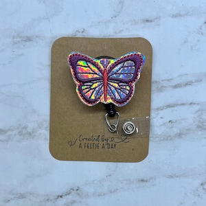 Butterfly interchangeable badge reel feltie topper