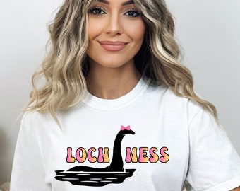 Big Pink Bow Ombre Loch Ness Comfort Colors Unisex Tshirt, Nessie Shirt, Cryptid Shirt, Loch Ness Tshirt, Fun Loch Ness, Cute Cryptids Tee