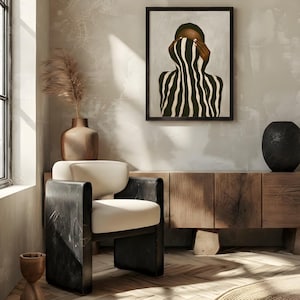 black woman art print painted as an abstract faceless portrait hanging in a Japandy interior