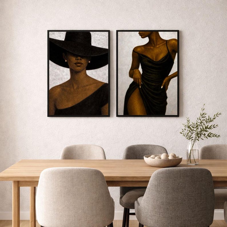 Elegant curated gallery wall decor with black woman portraits and black and grey colours.