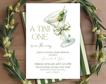 Könnte beinhalten: Eine weiße Babyparty-Einladungskarte mit einem Aquarell-Martiniglas, zwei Oliven und einer hellgrünen Schleife. Der Text lautet: A TINI ONE is on the way, JOIN US TO FOR A BABY SHOWER HONORING Amanda & John, FRIDAY, JUNE 08, 20YY AT 6 PM.