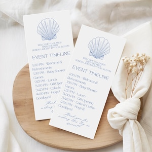 May include: A set of three ceramic mugs with a speckled, matte finish. The mugs are in shades of cream, light gray, and dark gray. Each mug has a simple, minimalist design and a rounded handle.