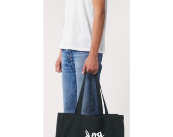May include: Black tote bag with white text that says "dog mama" and a paw print.