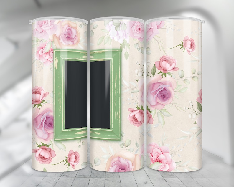 May include: Three 20 ounce stainless steel tumblers with a floral design. The tumblers have a green frame with a black chalkboard inside. The flowers are pink and white.