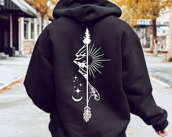 May include: Black hooded sweatshirt with a white graphic design of a mountain range, sun, moon, stars, and an arrow on the back.