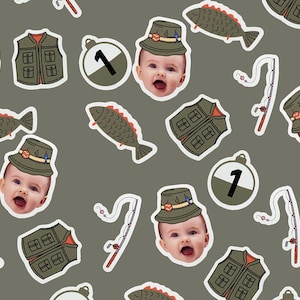 May include: A repeating pattern on a gray background features cartoon illustrations of a baby wearing a fishing hat, fish, fishing vests, fishing bobbers with the number 1, and fishing rods.