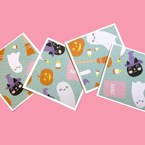 May include: Four square cards with a Halloween theme. Each card has a different pattern with ghosts, cats, pumpkins, candy corn, and broomsticks. The text "Treats" is on one of the cards.