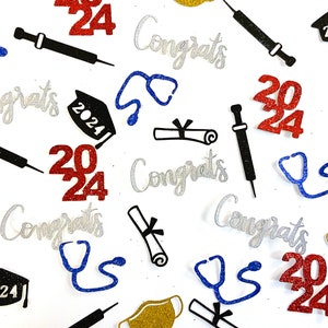 May include: Assortment of graduation confetti featuring a stethoscope, graduation cap, diploma, syringe, face mask, and the year 2024 in red glitter. The confetti is on a white background.