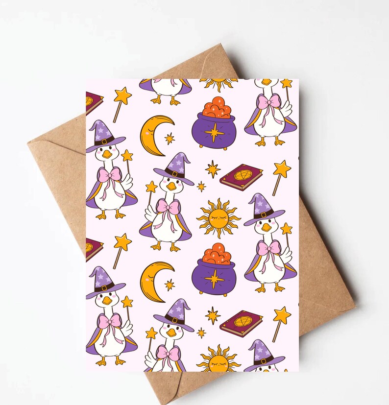 May include: A greeting card with a repeating pattern of cartoon geese dressed as witches, holding wands, and wearing purple hats and capes. The design includes moons, stars, suns, cauldrons, and spell books on a light pink background.