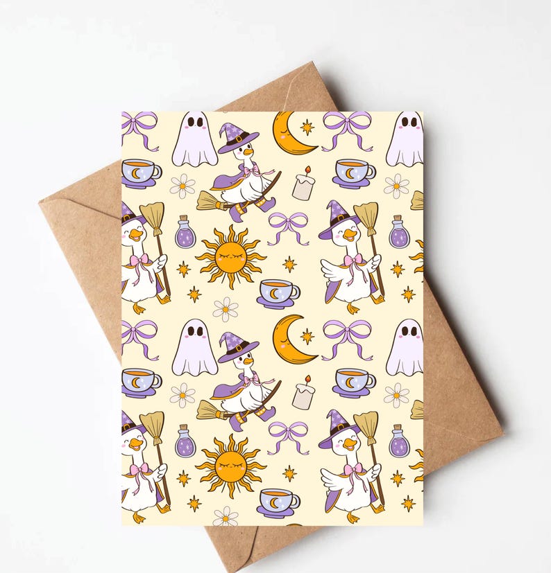 May include: Greeting card with a whimsical Halloween pattern. The design features a repeating pattern of witch geese riding brooms, ghosts, moons, suns, teacups, bows, and potion bottles on a cream background. The card is paired with a brown envelope.