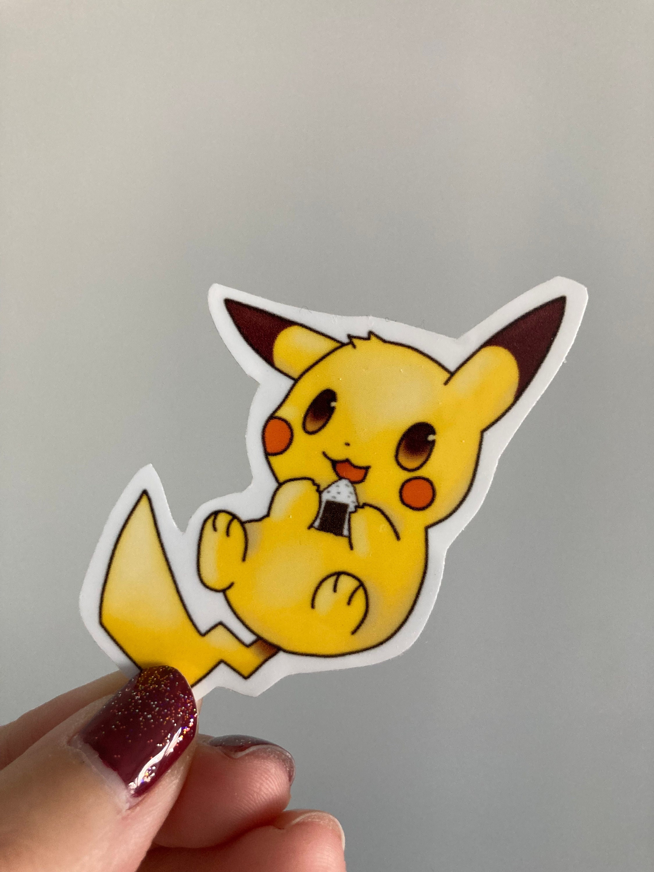 Cute Pikachu Eating Rice Ball Sticker two sizes - .de