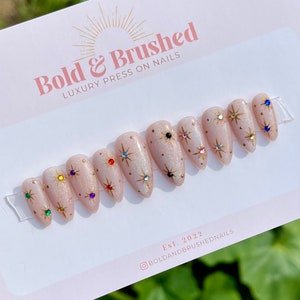 Rainbow Cat Eye, Stars and Gems Press On Nail Set, Eras Tour Jeweled Starburst Hand Painted Extensions.