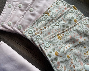 Fundas para arnés Pavlik, ropa para arnés Pavlik, reversibles con estampado floral y rosa, cierre a presión, listas para enviar.