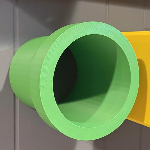 Warp Green Tube Shelf and Video Game Themed Wall Art