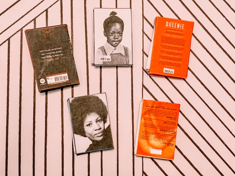 May include: Five paperback books with different covers. The books are on a striped background. The books are all different colours and have different titles. The titles are "They Killed My Mother", "Queenie", "How We Fight For Our Lives", and "The Hate U Give".