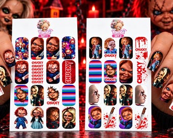 May include: Two rectangular sheets of nail decals featuring Chucky and Tiffany characters, blood splatters, knives, and the text Chucky. The Yambi brand logo is at the top of each sheet, labeled Set 1 and Set 2, with various horror-themed designs.