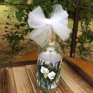 White Lilies Floral Bottle Vase Center Piece, 12 oz bottle ( shipping included in price).