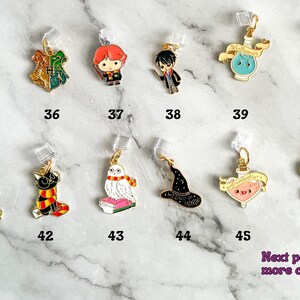 May include: A set of 11 Harry Potter themed charms, featuring characters, potions, and other magical items. The charms are made of metal and have a gold finish. The charms are numbered 35 through 46.